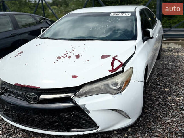 Белый Тойота Камри, объемом двигателя 2.5 л и пробегом 140 тыс. км за 11400 $, фото 2 на Automoto.ua