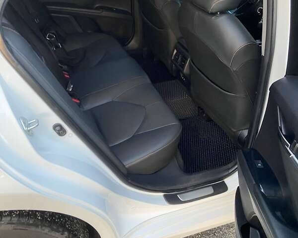 Белый Тойота Камри, объемом двигателя 2.49 л и пробегом 150 тыс. км за 21000 $, фото 24 на Automoto.ua