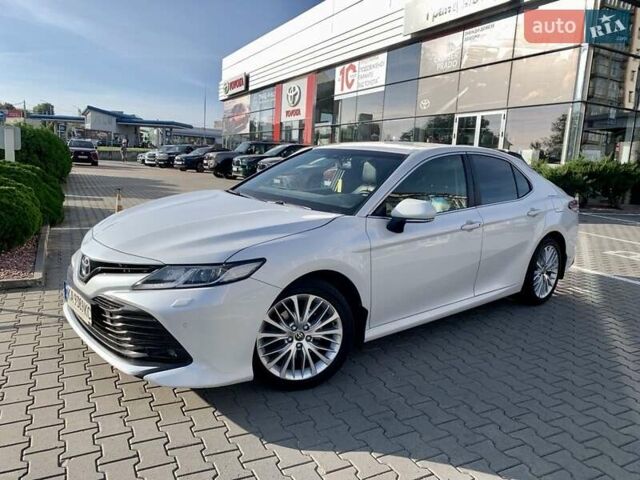 Белый Тойота Камри, объемом двигателя 2.5 л и пробегом 104 тыс. км за 21900 $, фото 1 на Automoto.ua