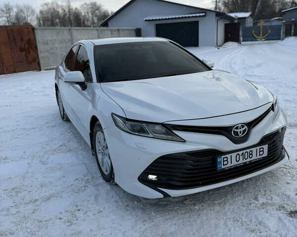 Белый Тойота Камри, объемом двигателя 2.5 л и пробегом 122 тыс. км за 22800 $, фото 1 на Automoto.ua