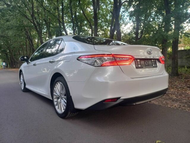 Белый Тойота Камри, объемом двигателя 2.5 л и пробегом 93 тыс. км за 25000 $, фото 2 на Automoto.ua