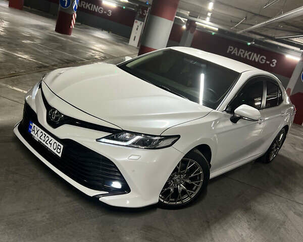 Белый Тойота Камри, объемом двигателя 2.49 л и пробегом 157 тыс. км за 22900 $, фото 4 на Automoto.ua