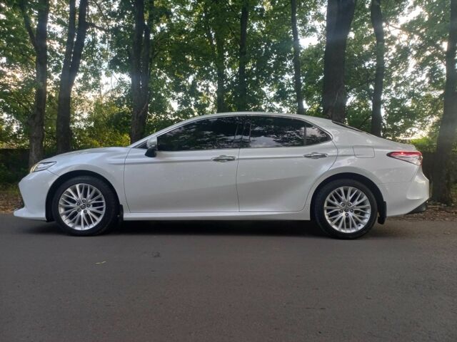 Белый Тойота Камри, объемом двигателя 2.5 л и пробегом 93 тыс. км за 25000 $, фото 1 на Automoto.ua