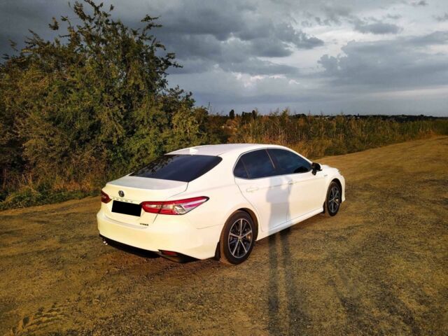 Белый Тойота Камри, объемом двигателя 2.5 л и пробегом 100 тыс. км за 22000 $, фото 1 на Automoto.ua