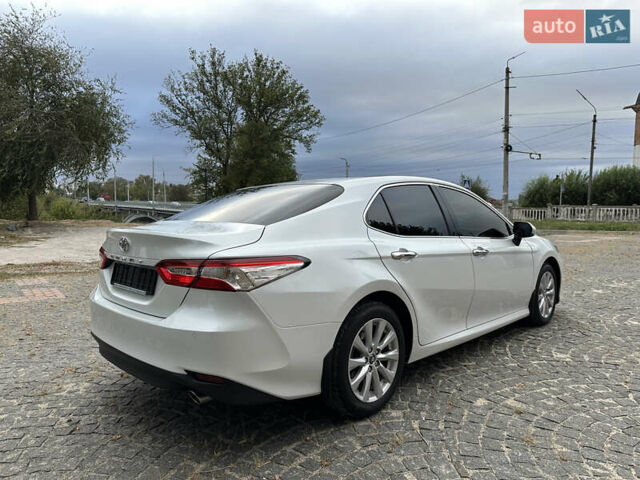 Білий Тойота Камрі, об'ємом двигуна 2.49 л та пробігом 160 тис. км за 23400 $, фото 5 на Automoto.ua