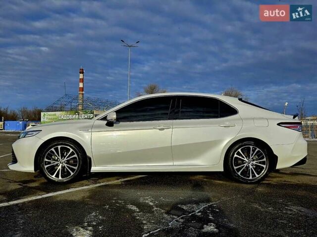 Белый Тойота Камри, объемом двигателя 2.49 л и пробегом 63 тыс. км за 23900 $, фото 3 на Automoto.ua