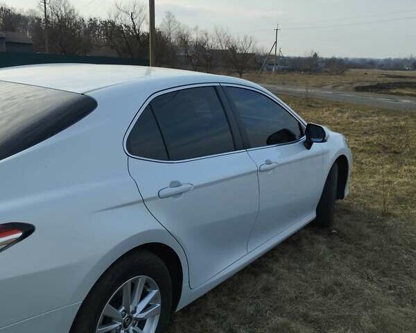 Белый Тойота Камри, объемом двигателя 2.49 л и пробегом 50 тыс. км за 23600 $, фото 1 на Automoto.ua