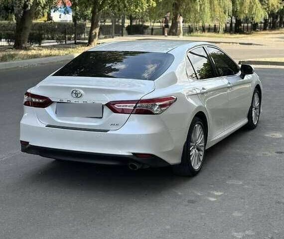 Белый Тойота Камри, объемом двигателя 2.5 л и пробегом 58 тыс. км за 15500 $, фото 5 на Automoto.ua