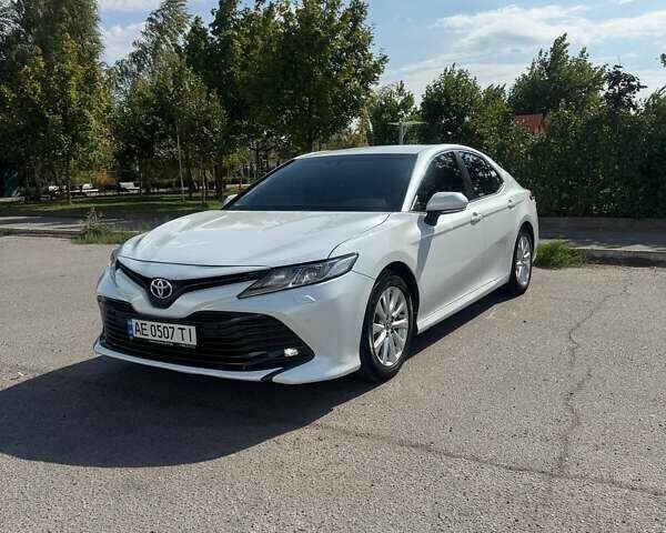 Белый Тойота Камри, объемом двигателя 2.49 л и пробегом 153 тыс. км за 19800 $, фото 1 на Automoto.ua