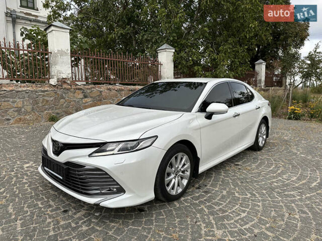 Білий Тойота Камрі, об'ємом двигуна 2.49 л та пробігом 160 тис. км за 23400 $, фото 1 на Automoto.ua
