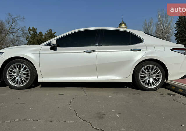 Білий Тойота Камрі, об'ємом двигуна 2.5 л та пробігом 115 тис. км за 23499 $, фото 25 на Automoto.ua