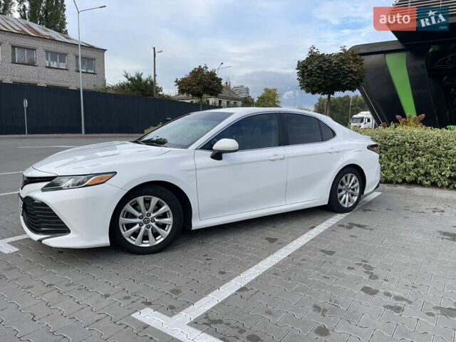 Белый Тойота Камри, объемом двигателя 2.49 л и пробегом 143 тыс. км за 17600 $, фото 4 на Automoto.ua