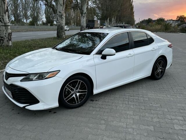 Белый Тойота Камри, объемом двигателя 2.5 л и пробегом 116 тыс. км за 16950 $, фото 1 на Automoto.ua