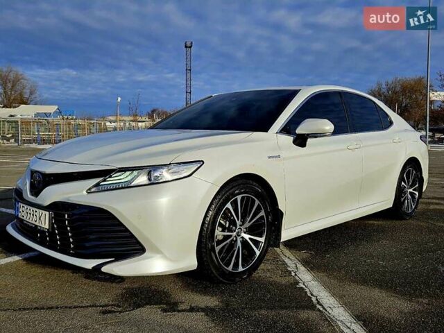Белый Тойота Камри, объемом двигателя 2.49 л и пробегом 63 тыс. км за 23900 $, фото 1 на Automoto.ua
