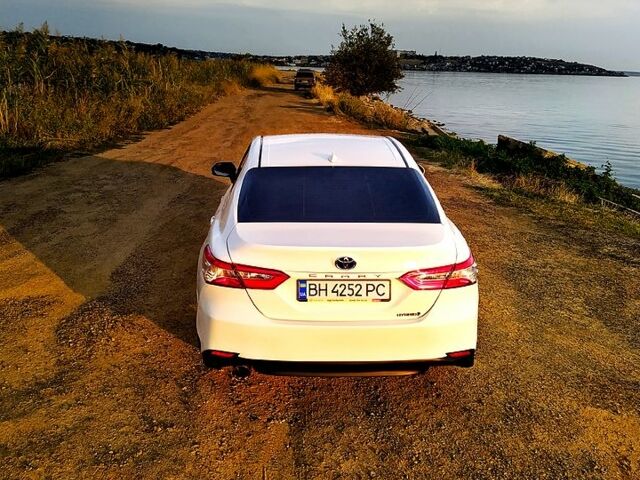 Белый Тойота Камри, объемом двигателя 2.5 л и пробегом 101 тыс. км за 24500 $, фото 2 на Automoto.ua