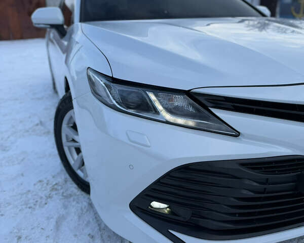 Белый Тойота Камри, объемом двигателя 2.5 л и пробегом 122 тыс. км за 22800 $, фото 25 на Automoto.ua