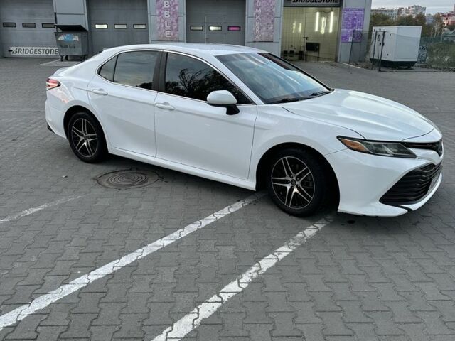 Белый Тойота Камри, объемом двигателя 2.5 л и пробегом 116 тыс. км за 16950 $, фото 2 на Automoto.ua