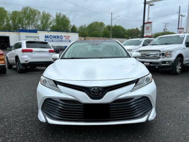 Білий Тойота Камрі, об'ємом двигуна 2.5 л та пробігом 66 тис. км за 16000 $, фото 1 на Automoto.ua