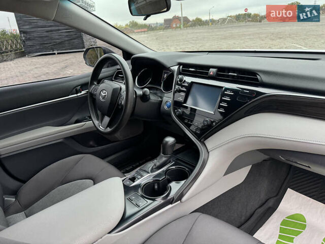 Белый Тойота Камри, объемом двигателя 2.49 л и пробегом 128 тыс. км за 22500 $, фото 25 на Automoto.ua