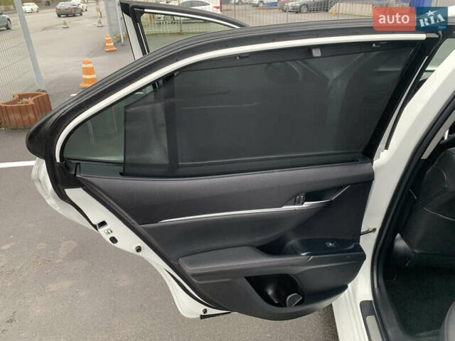 Белый Тойота Камри, объемом двигателя 2.49 л и пробегом 63 тыс. км за 23500 $, фото 26 на Automoto.ua