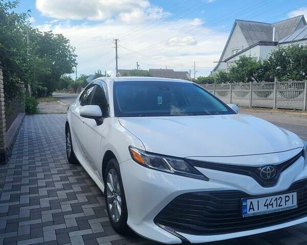Білий Тойота Камрі, об'ємом двигуна 2.49 л та пробігом 150 тис. км за 20300 $, фото 1 на Automoto.ua