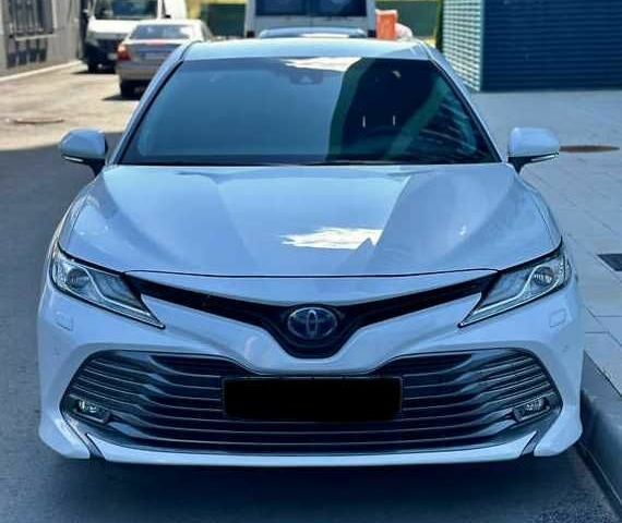 Белый Тойота Камри, объемом двигателя 2.5 л и пробегом 105 тыс. км за 18000 $, фото 1 на Automoto.ua