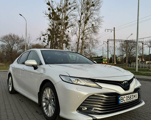 Белый Тойота Камри, объемом двигателя 2.49 л и пробегом 80 тыс. км за 27500 $, фото 3 на Automoto.ua
