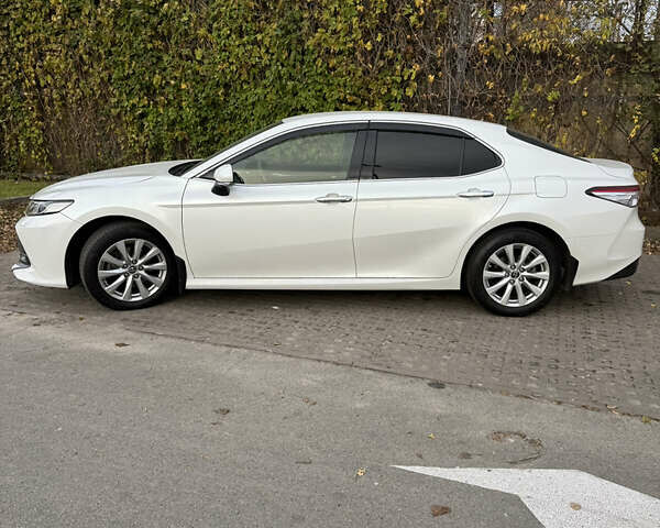 Білий Тойота Камрі, об'ємом двигуна 2.49 л та пробігом 265 тис. км за 24000 $, фото 1 на Automoto.ua
