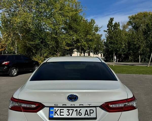 Белый Тойота Камри, объемом двигателя 2.49 л и пробегом 101 тыс. км за 28000 $, фото 4 на Automoto.ua