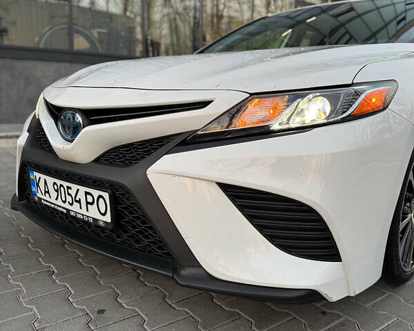 Білий Тойота Камрі, об'ємом двигуна 2.49 л та пробігом 58 тис. км за 20500 $, фото 1 на Automoto.ua