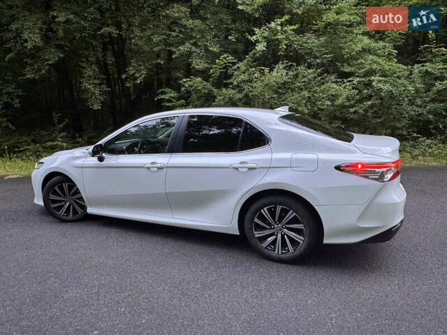 Білий Тойота Камрі, об'ємом двигуна 2.49 л та пробігом 82 тис. км за 27250 $, фото 2 на Automoto.ua