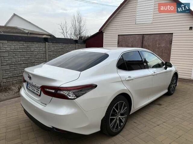Белый Тойота Камри, объемом двигателя 2.49 л и пробегом 106 тыс. км за 33000 $, фото 2 на Automoto.ua