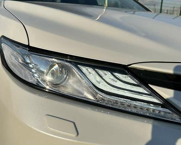 Белый Тойота Камри, объемом двигателя 2.49 л и пробегом 15 тыс. км за 37000 $, фото 5 на Automoto.ua