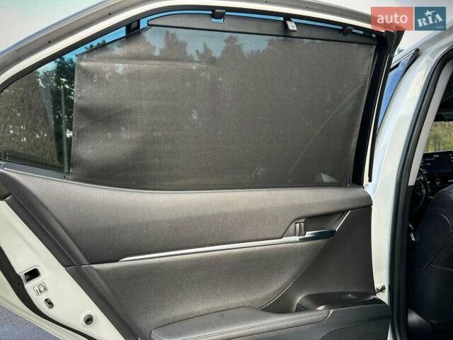 Белый Тойота Камри, объемом двигателя 2.49 л и пробегом 65 тыс. км за 36999 $, фото 78 на Automoto.ua