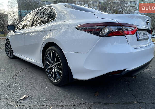 Белый Тойота Камри, объемом двигателя 2.49 л и пробегом 114 тыс. км за 23500 $, фото 12 на Automoto.ua