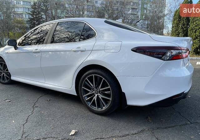 Белый Тойота Камри, объемом двигателя 2.49 л и пробегом 114 тыс. км за 23500 $, фото 11 на Automoto.ua