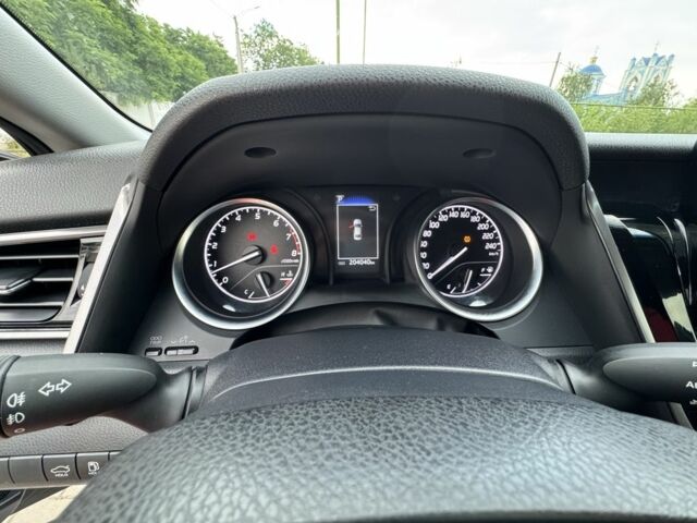 Белый Тойота Камри, объемом двигателя 2.5 л и пробегом 204 тыс. км за 21500 $, фото 8 на Automoto.ua