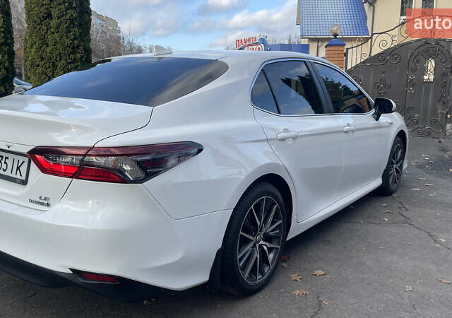 Белый Тойота Камри, объемом двигателя 2.49 л и пробегом 114 тыс. км за 23500 $, фото 25 на Automoto.ua