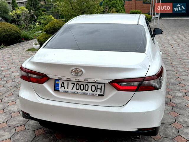 Білий Тойота Камрі, об'ємом двигуна 2.49 л та пробігом 105 тис. км за 26400 $, фото 1 на Automoto.ua