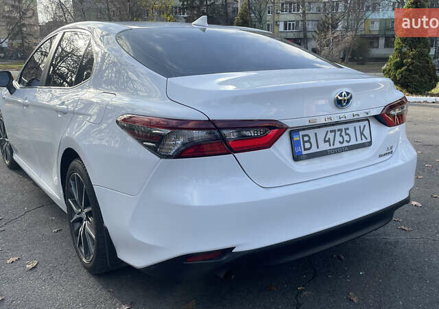 Белый Тойота Камри, объемом двигателя 2.49 л и пробегом 114 тыс. км за 23500 $, фото 14 на Automoto.ua