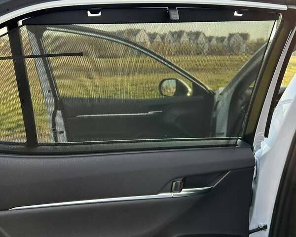 Белый Тойота Камри, объемом двигателя 2.49 л и пробегом 15 тыс. км за 37000 $, фото 29 на Automoto.ua