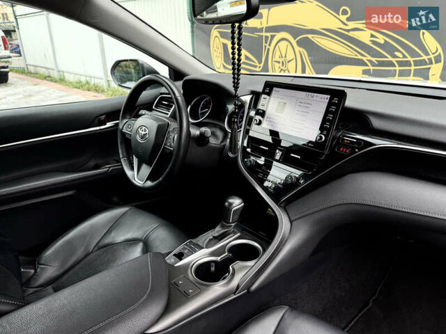 Белый Тойота Камри, объемом двигателя 2.49 л и пробегом 110 тыс. км за 25300 $, фото 25 на Automoto.ua