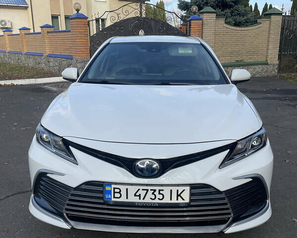 Белый Тойота Камри, объемом двигателя 2.49 л и пробегом 114 тыс. км за 23500 $, фото 1 на Automoto.ua