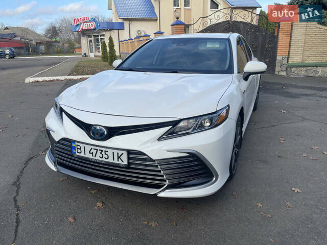 Белый Тойота Камри, объемом двигателя 2.49 л и пробегом 114 тыс. км за 23500 $, фото 2 на Automoto.ua