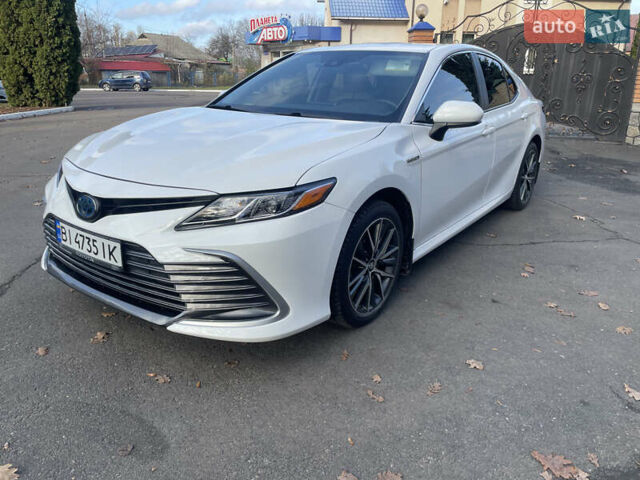 Белый Тойота Камри, объемом двигателя 2.49 л и пробегом 114 тыс. км за 23500 $, фото 3 на Automoto.ua