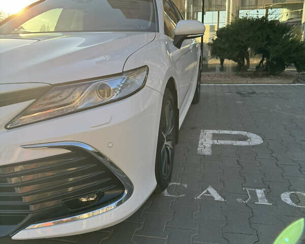 Белый Тойота Камри, объемом двигателя 2.49 л и пробегом 95 тыс. км за 32000 $, фото 7 на Automoto.ua