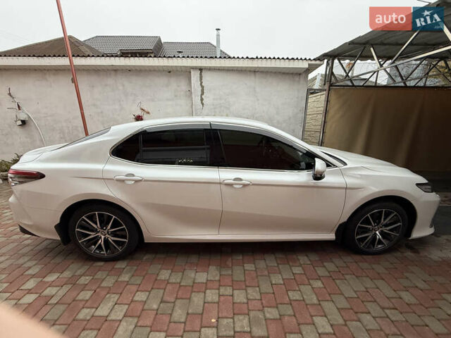 Белый Тойота Камри, объемом двигателя 2.49 л и пробегом 22 тыс. км за 41000 $, фото 3 на Automoto.ua