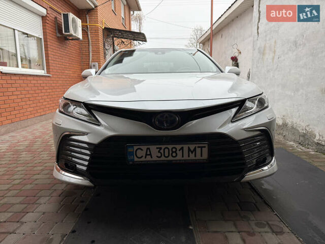 Белый Тойота Камри, объемом двигателя 2.49 л и пробегом 22 тыс. км за 41000 $, фото 1 на Automoto.ua