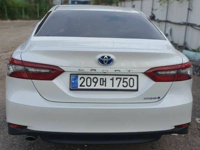 Белый Тойота Камри, объемом двигателя 2.5 л и пробегом 22 тыс. км за 27600 $, фото 1 на Automoto.ua