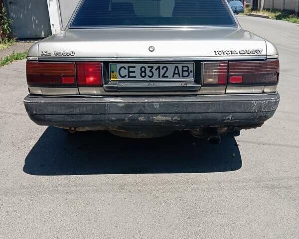 Бежевый Тойота Камри, объемом двигателя 2 л и пробегом 425 тыс. км за 1000 $, фото 6 на Automoto.ua